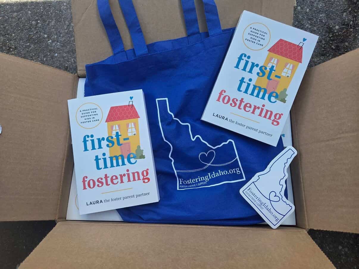Welcome Kit materials, including the First Time Fostering book