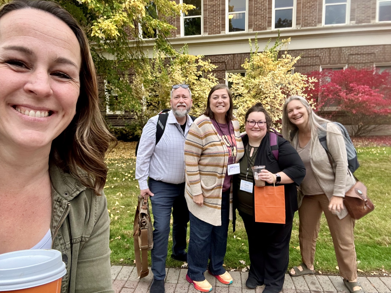 FRTC director and staff gathered outdoors during a professional event